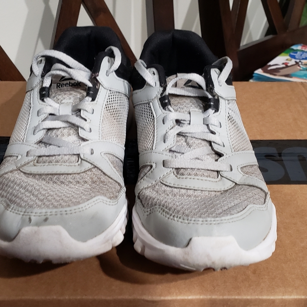Men's pair of Reebok Shoes